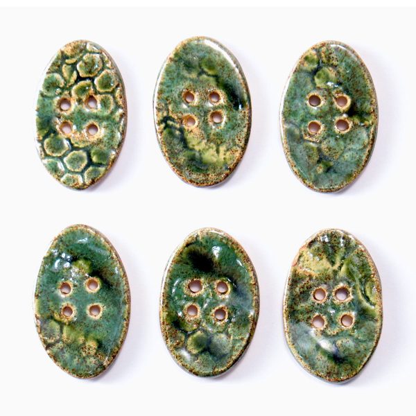 Guzik ceramiczny owalny zielony, dekoracyjna pasmanteria