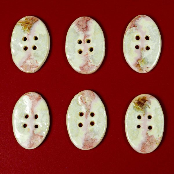 Guzik ceramiczny owalny różowo-biały dekoracyjny dodatek