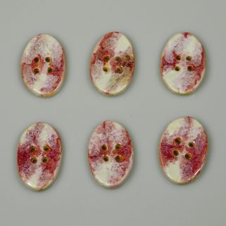 Guzik ceramiczny owalny biało-różowy, oryginalna ozdoba
