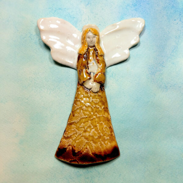 Miodowy anioł ceramiczny