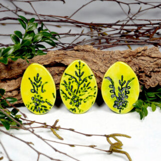 Żółte ozdobne jajka na lodówkę ręcznie wykonane dekoracje na magnes