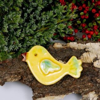 Żółty ptaszek ceramiczny na lodówkę