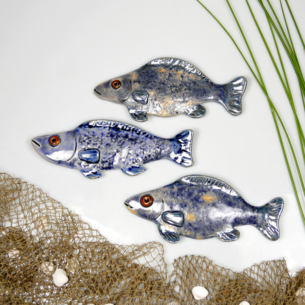 Ławica śledzi ceramicznych na ścianę